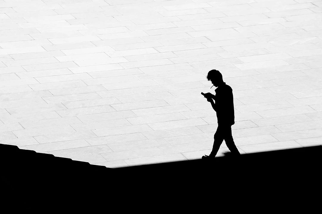 Silhouette of man walking
