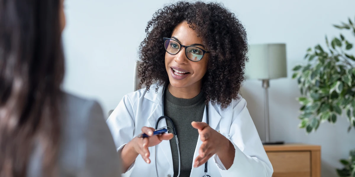 Doctor talking with patient